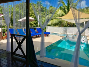  Hummingbirds Cabins  Caye Caulker